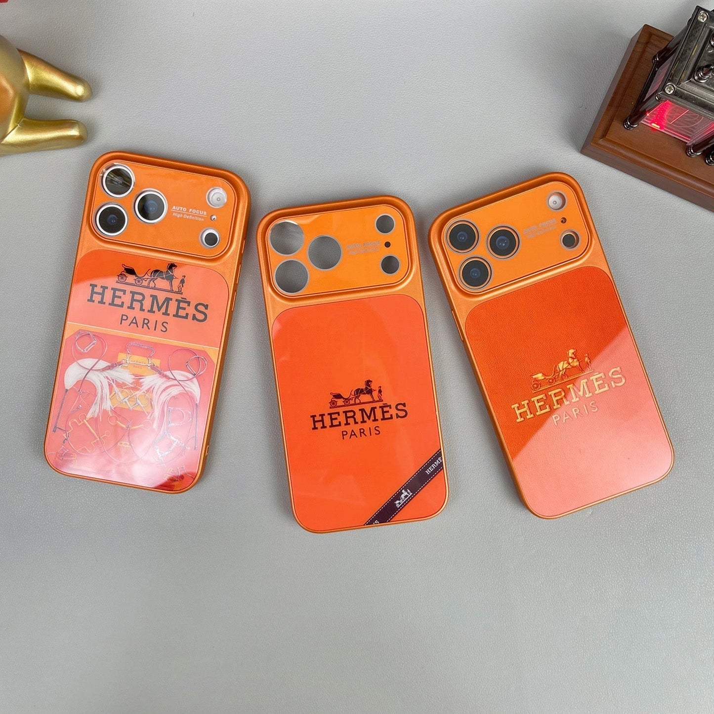 H Luxuriöse iPhone-Hülle aus der Orange-Serie