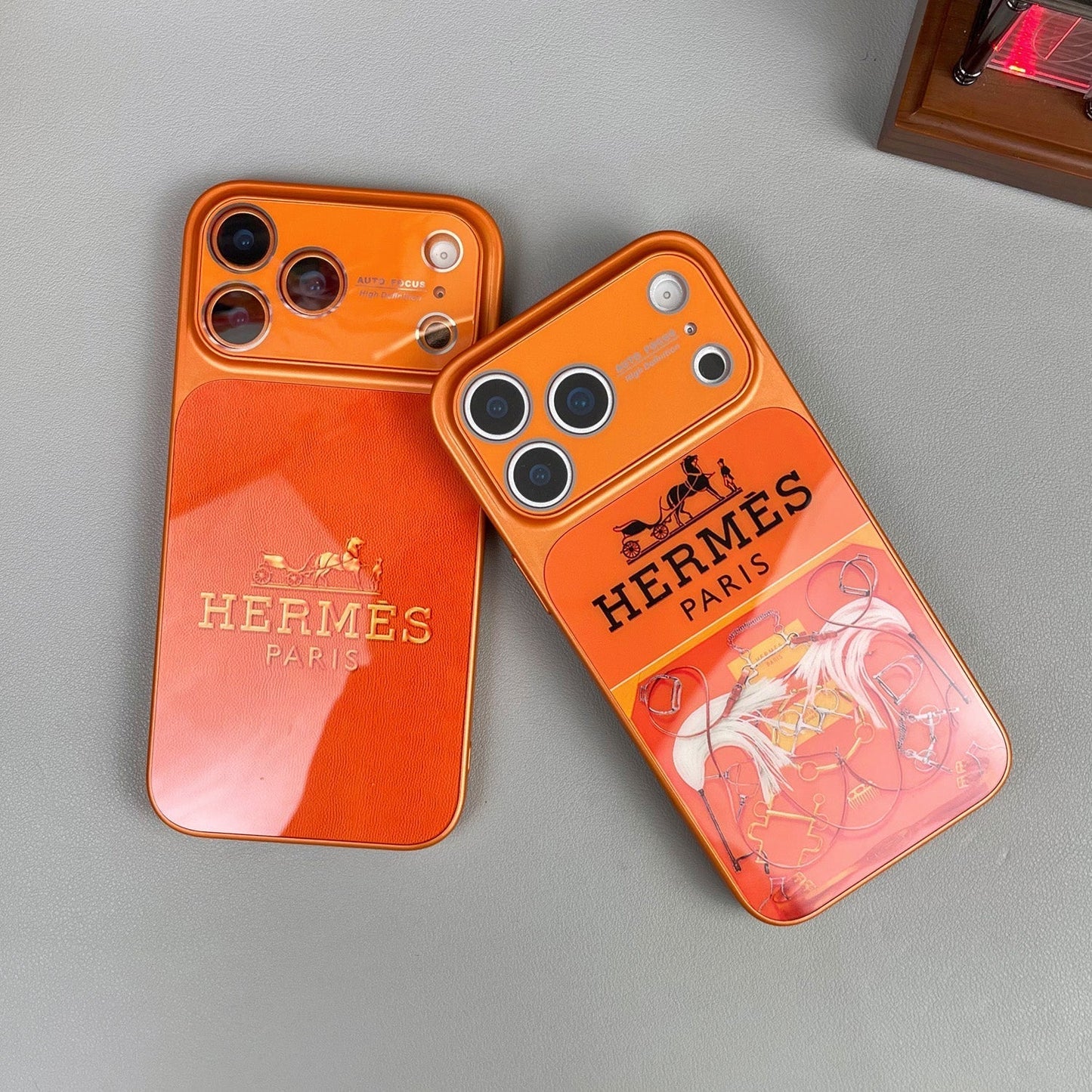 H Luxuriöse iPhone-Hülle aus der Orange-Serie