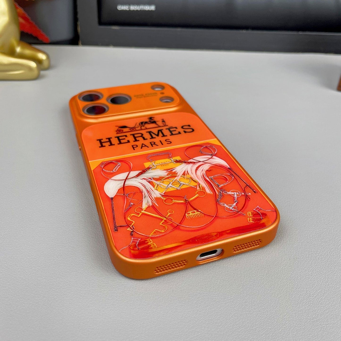 H Luxuriöse iPhone-Hülle aus der Orange-Serie