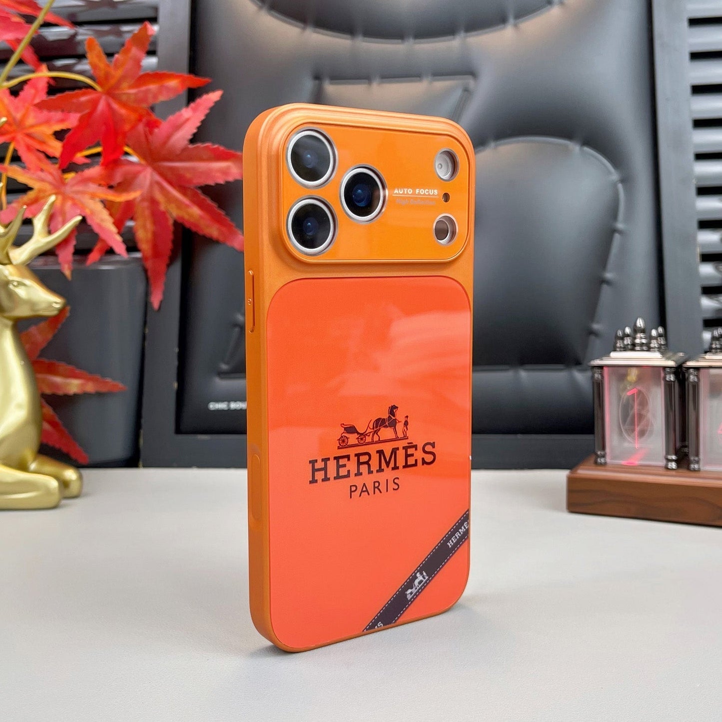 H Luxuriöse iPhone-Hülle aus der Orange-Serie