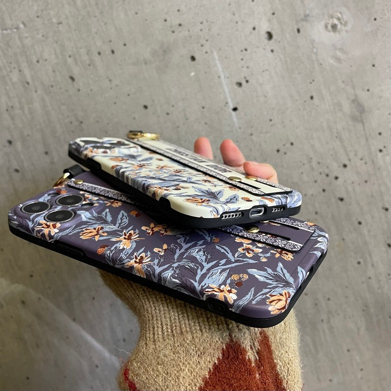 Mote lilla og hvite armbånds-iPhone-deksel