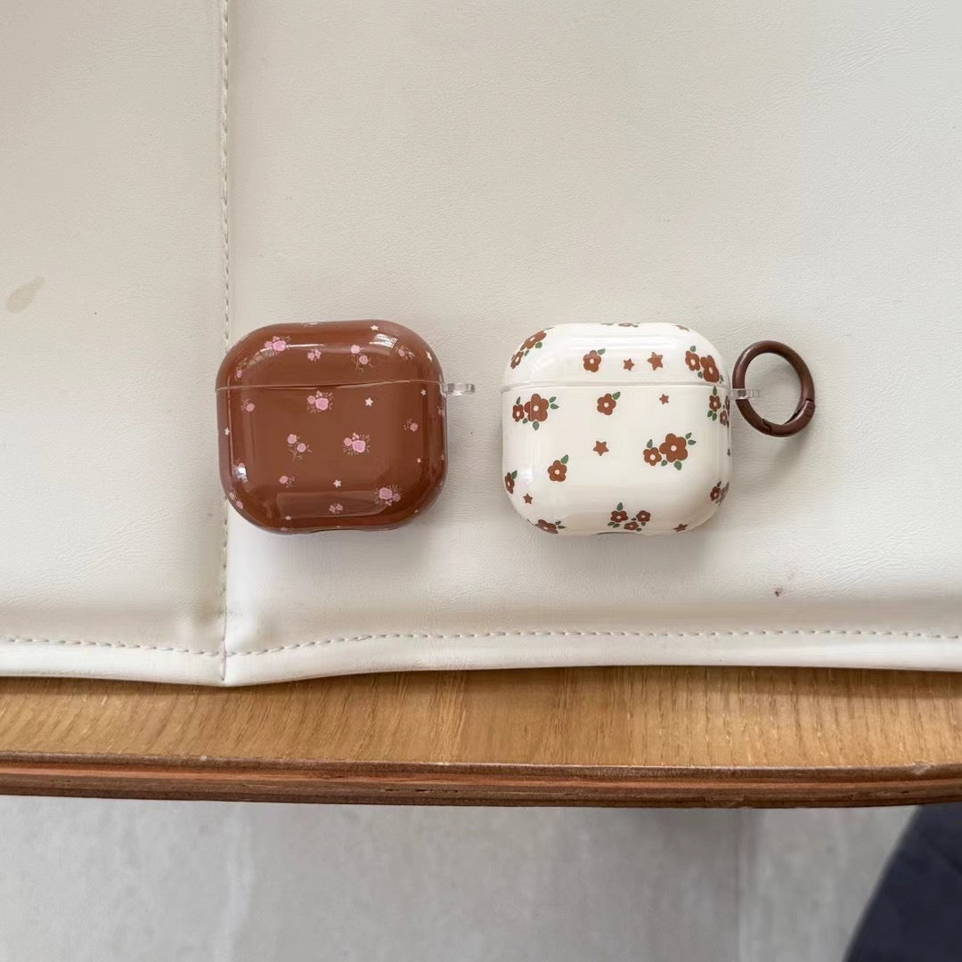 Niedliche AirPods-Hülle mit Blumenmuster