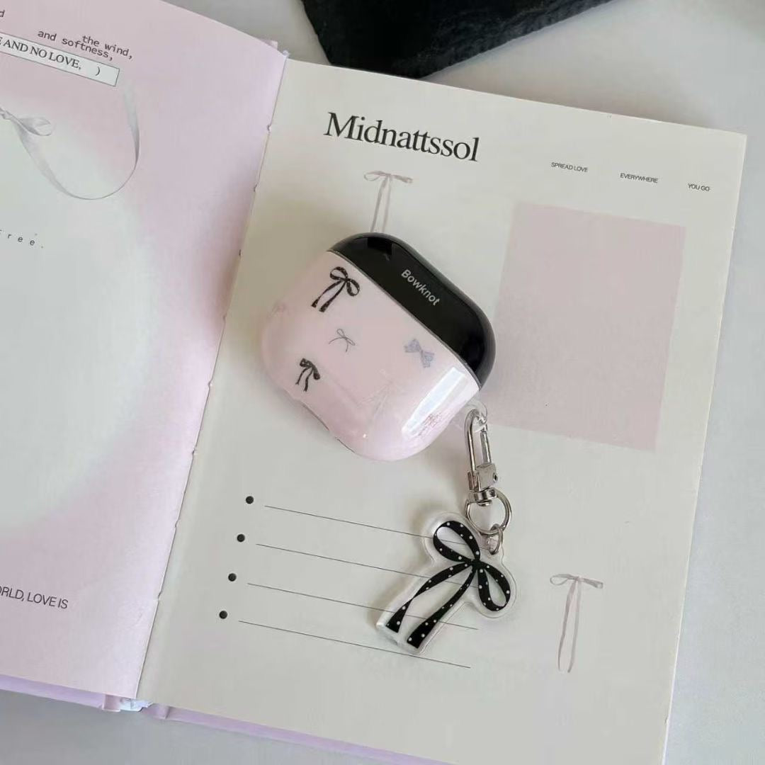 Ovitek za slušalke AirPods z roza pentljo in obeskom s trakom