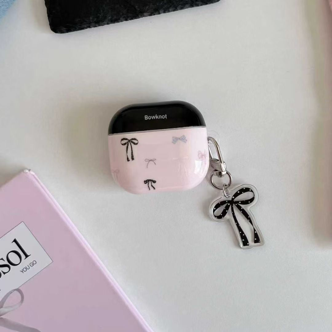 Ovitek za slušalke AirPods z roza pentljo in obeskom s trakom