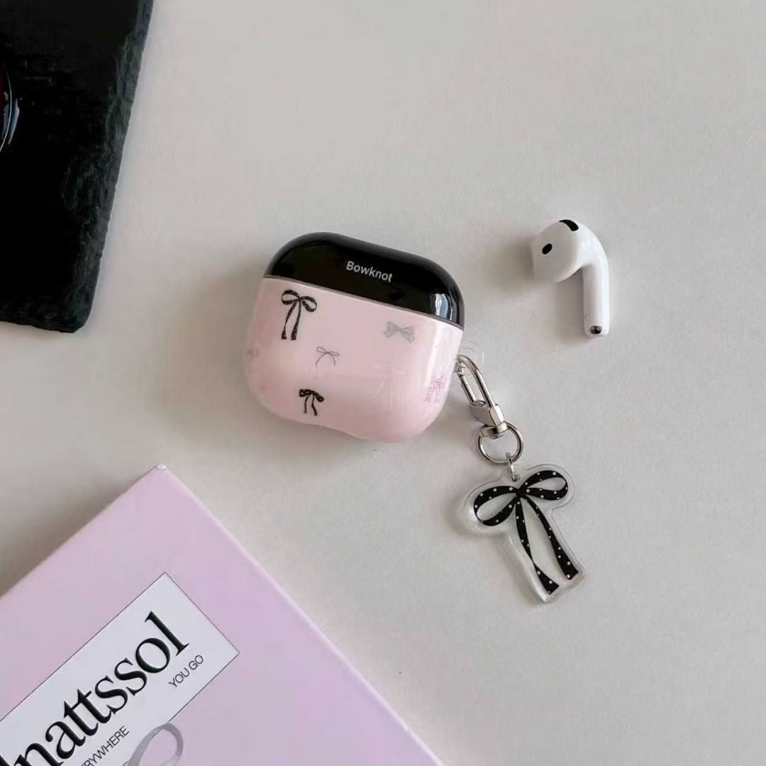 Ovitek za slušalke AirPods z roza pentljo in obeskom s trakom