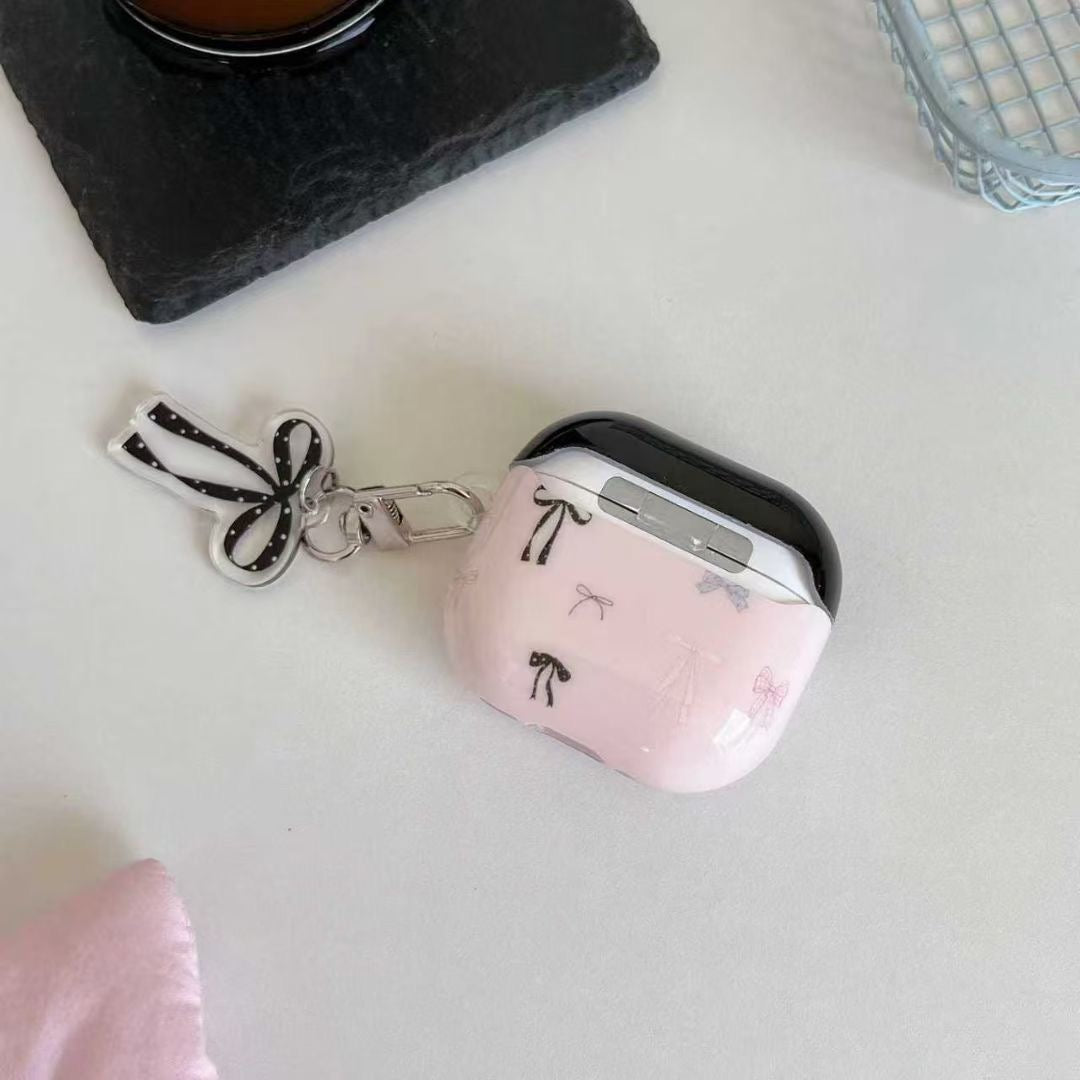 Ovitek za slušalke AirPods z roza pentljo in obeskom s trakom