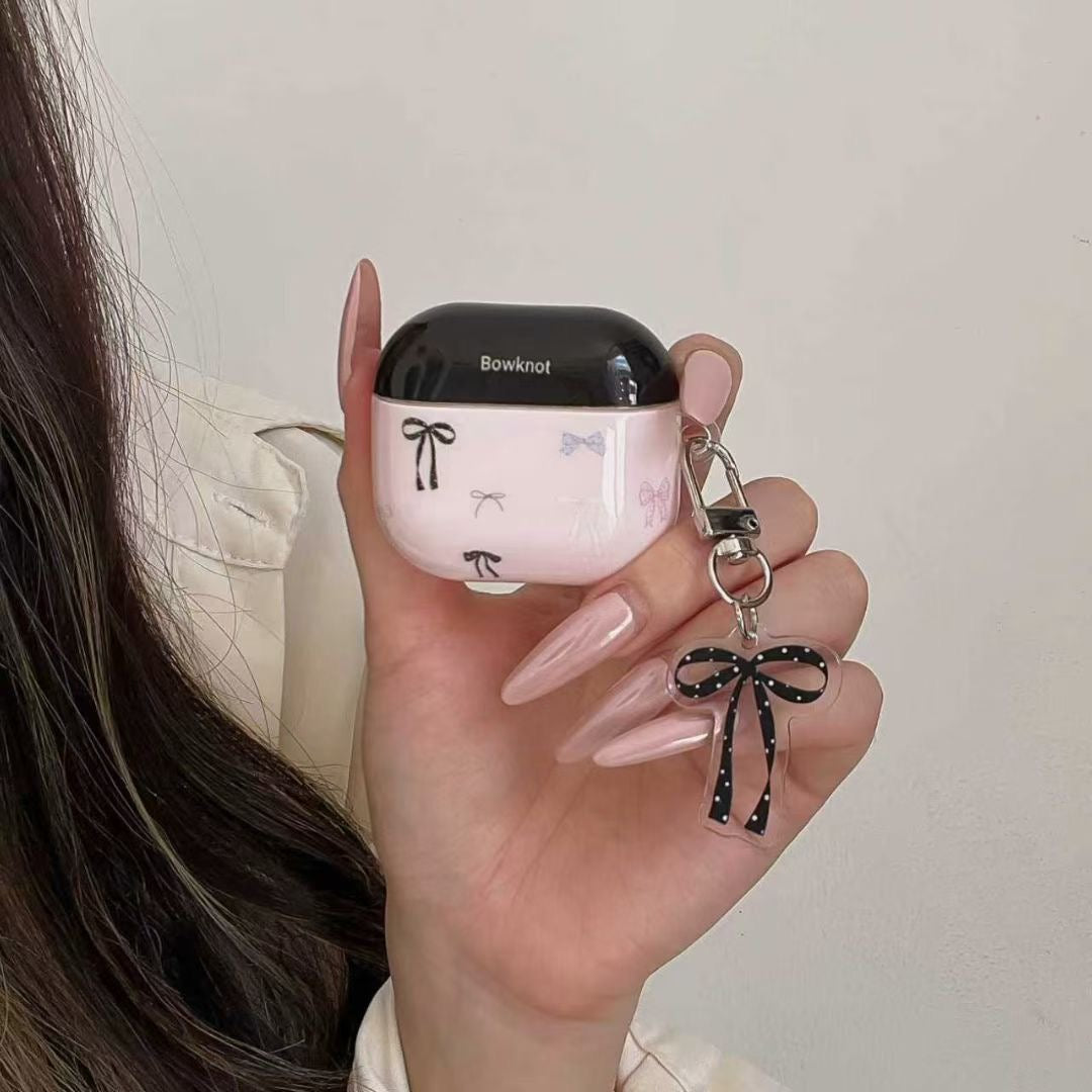 Ovitek za slušalke AirPods z roza pentljo in obeskom s trakom