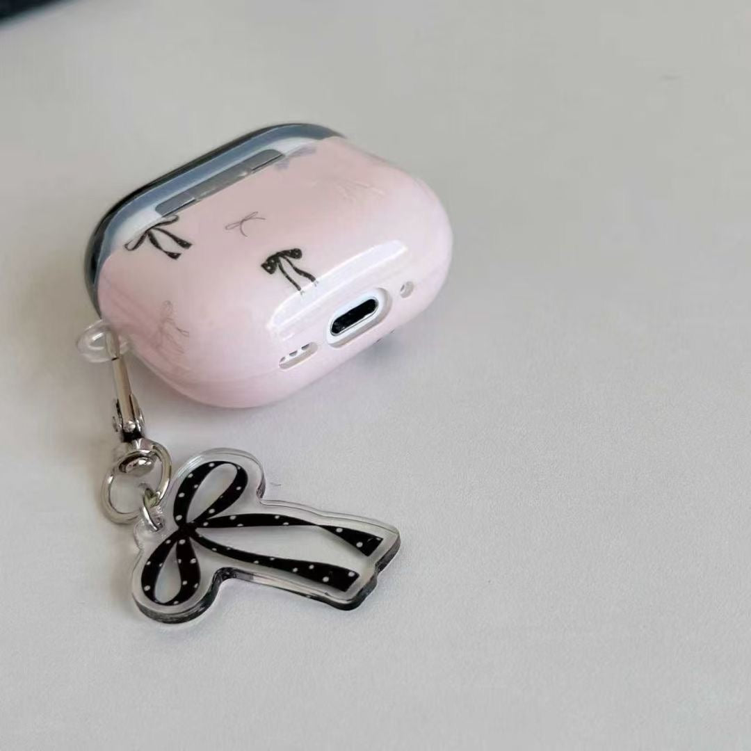 Ovitek za slušalke AirPods z roza pentljo in obeskom s trakom