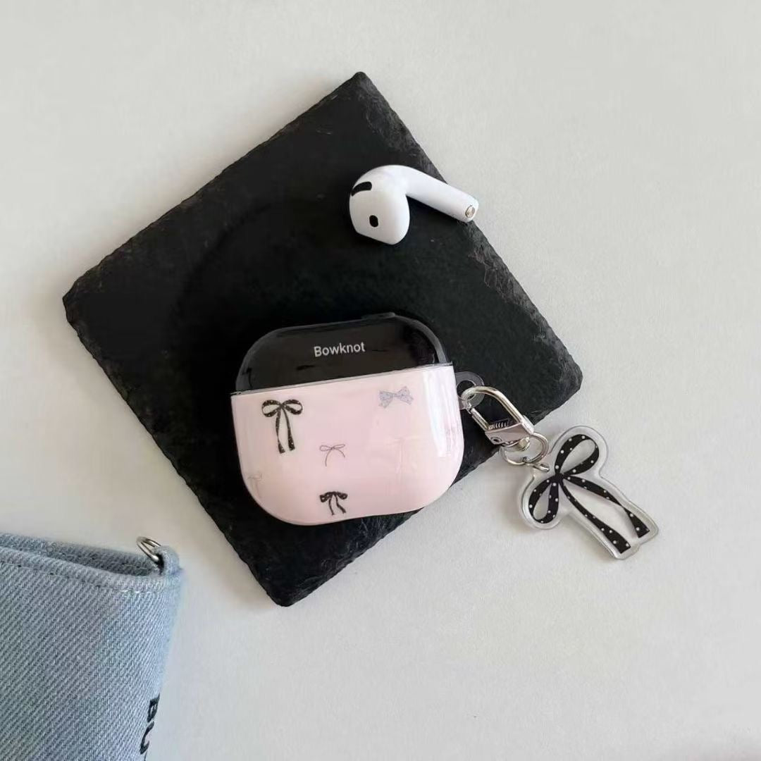 Ovitek za slušalke AirPods z roza pentljo in obeskom s trakom