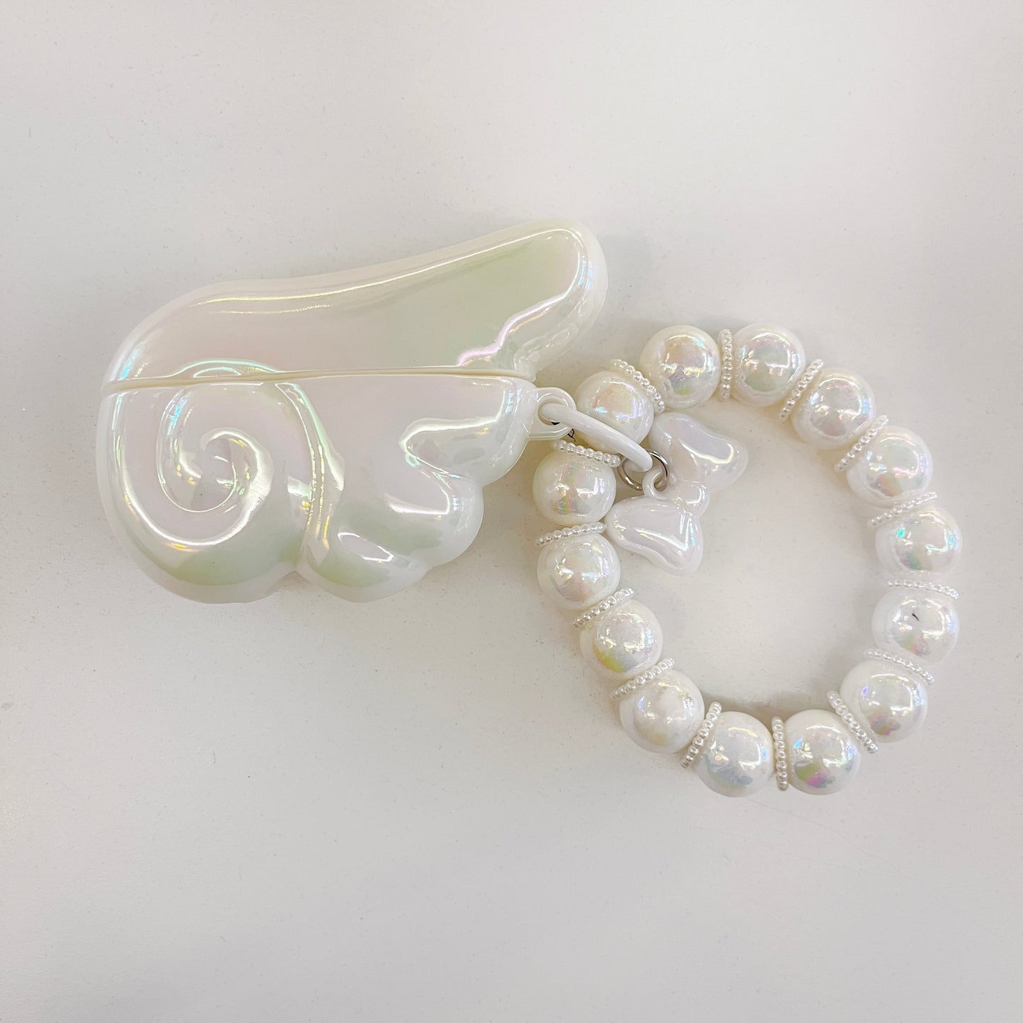 Sciathán Aingeal Cás AirPods le Péarla & Suath Feirbeach