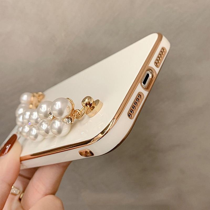 Custodia per iPhone con catena di perle lucide